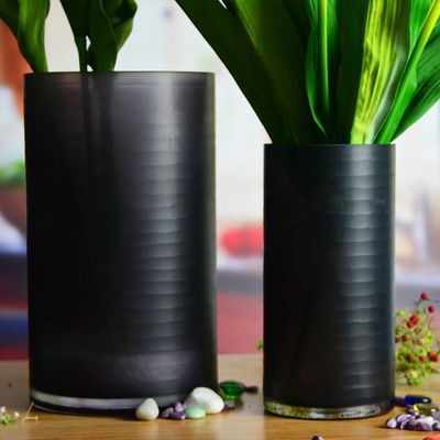 qualidade Vaso de vidro decorativo de cilindro gravado à mão, Vaso de cilindro centrais com padrão fábrica