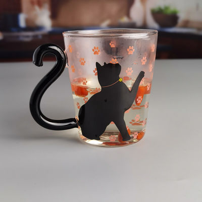 qualidade Taça de chá de vidro de gato preto de borosilicato com alça de cauda colorida fábrica
